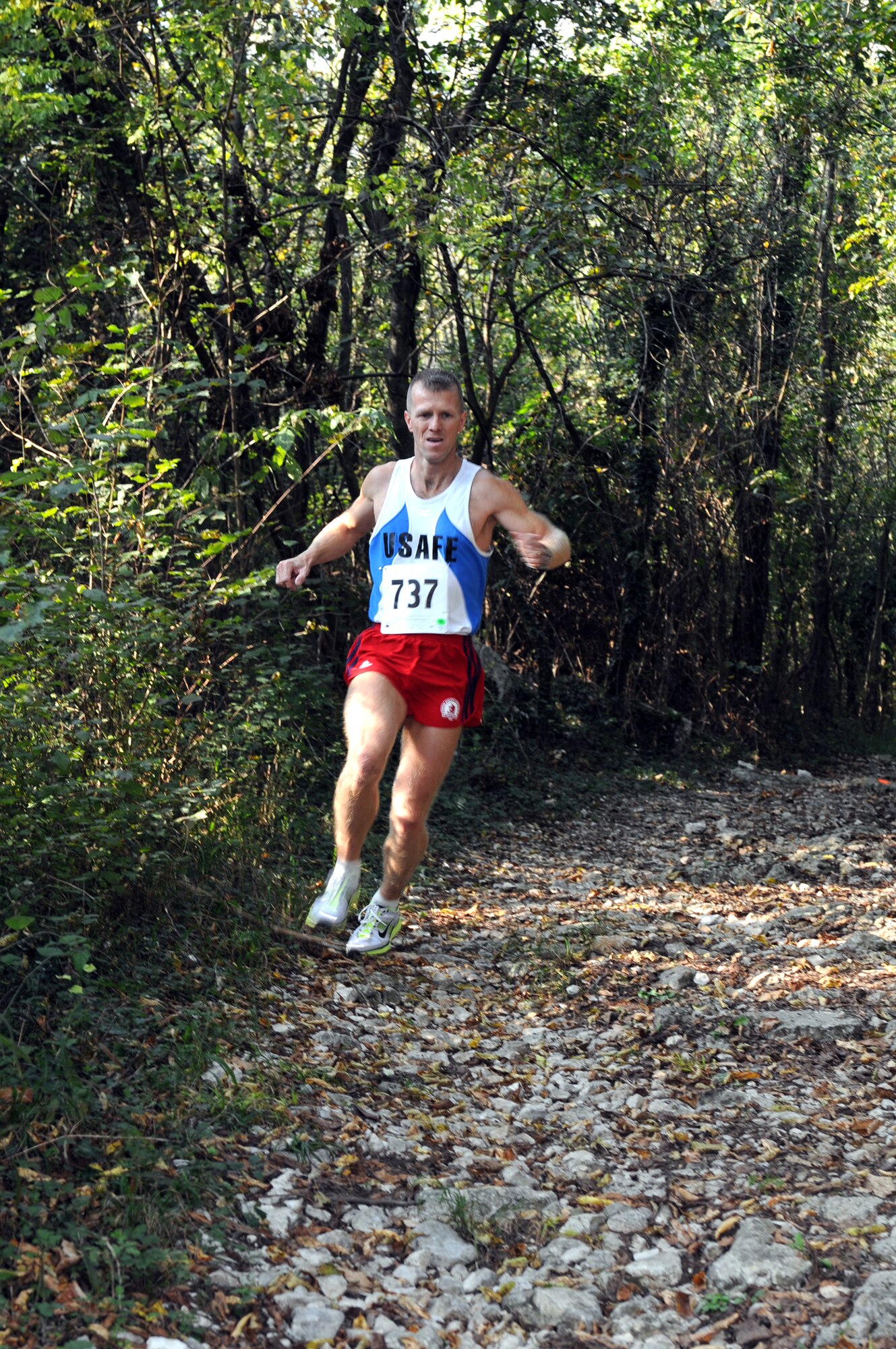 Donnie Gray, 31st Communications Squadron, runs along the 2010 U.S. Air Forces in Europe Cross-Country Central Region Championships 10 km course Oct. 15 at Madonna Del Monte, Aviano, Italy. Gray took first place in the men's 10 km race with a time of 38:35, while Antoaneta Fitzpatrick, 31st Medical Group, took first in the women's 5 km event with a time of 24:19. (U.S. Air Force photo/Staff Sgt. Julius Delos Reyes)