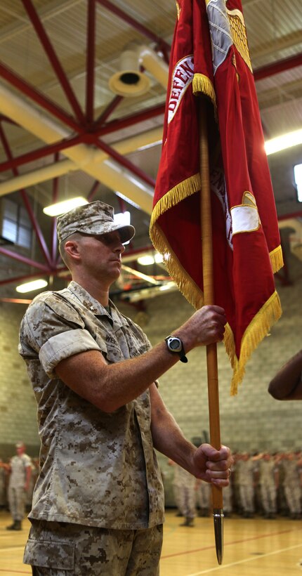 Lieutenant Col. Aaron Weiss officially receives the 3rd Low Altitude Air Defense Battalion colors during a change of command ceremony at Camp Del Mar, Oct. 19.