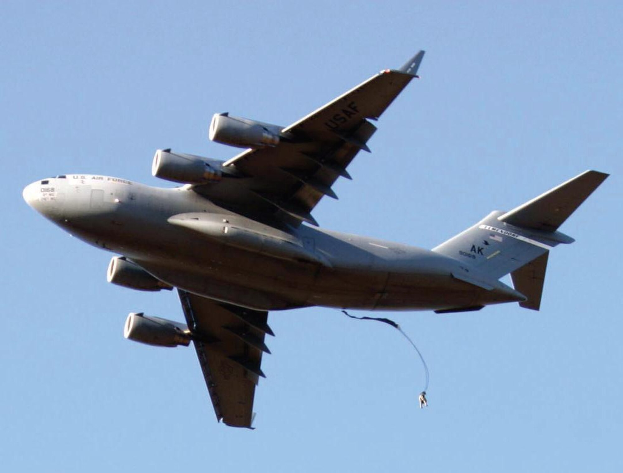 A 6th Engineer Battalion Soldier jumps from a C-17 during a ceremony marking the battalion’s formal transformation to an airborne unit Oct. 14 at Joint Base Elmendorf-Richardson’s Malemute Drop Zone. More than 70 of the unit’s Soldiers took part in the ceremonial jump. (U.S. Army photo/Sgt. Geoff Van Horn)
