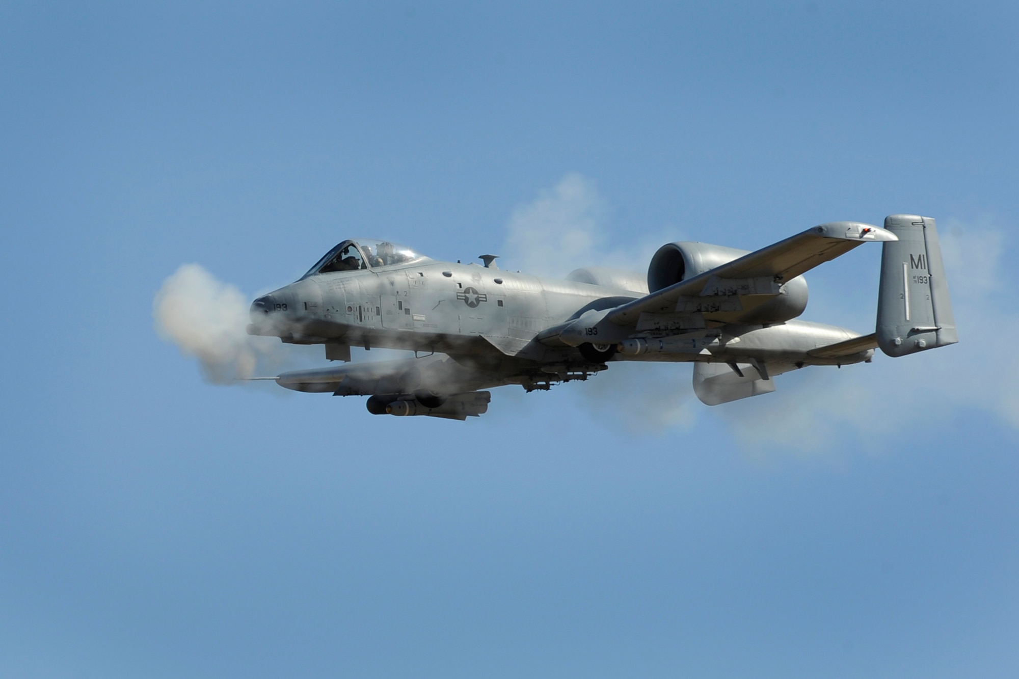 A 107th Fighter Squadron, A-10 Thunderbolt II blasts its' 30mm gatling gun during Hawgsmoke 2010. The 107th Fighter Squadron, from the 127th Wing, Selfridge Air National Guard Base, Mich., recently participated in the biennial A-10 Thunderbolt II bombing, missile and tactical gunnery competition known as Hawgsmoke. This year's competition was held at Gowen Air National Guard Base, Boise, Idaho from Oct. 13 to 16. The competition allows A-10 pilots and maintenance personnel to test their skills through friendly competition.  (USAF Photo by MSgt. Terry Atwell) (Released)