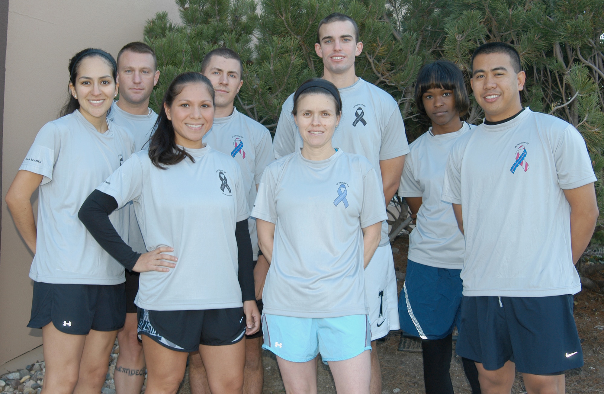 Members of the 55th Force Support Squadron marathon running team pose for a group photo Oct. 8, 2010, outside the field house at Offutt Air Force Base, Neb. The team is training to run the Rock 'n' Roll San Antonio Marathon on Nov. 14, 2010. (U.S. Air Force photo/Staff Sgt. James M. Hodgman)