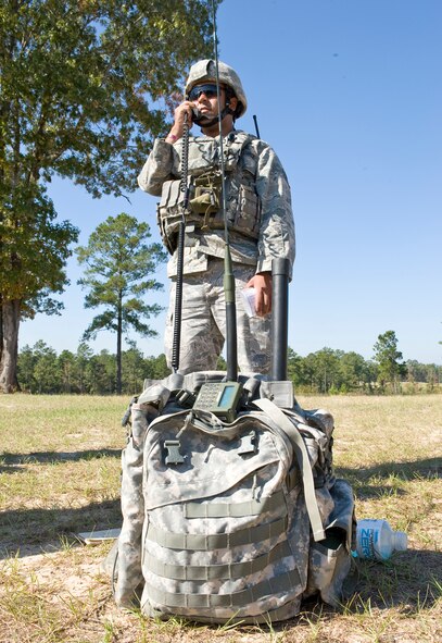 WARRIOR MILITARY OPERATIONS AREA, La. -- Senior Airman Alexander Hardy, a Joint Terminal Attack Controller assigned to Fort Stewart, Ga., calls in air support during a training scenario near Fort Polk, La., as part of Exercise Green Flag East 11-01 Oct. 13. GFE 11-01 is a global response exercise involving Air Force and Army personnel from various bases around the country. (U.S. Air Force photo by Senior Airman Chad Warren)(RELEASED) 