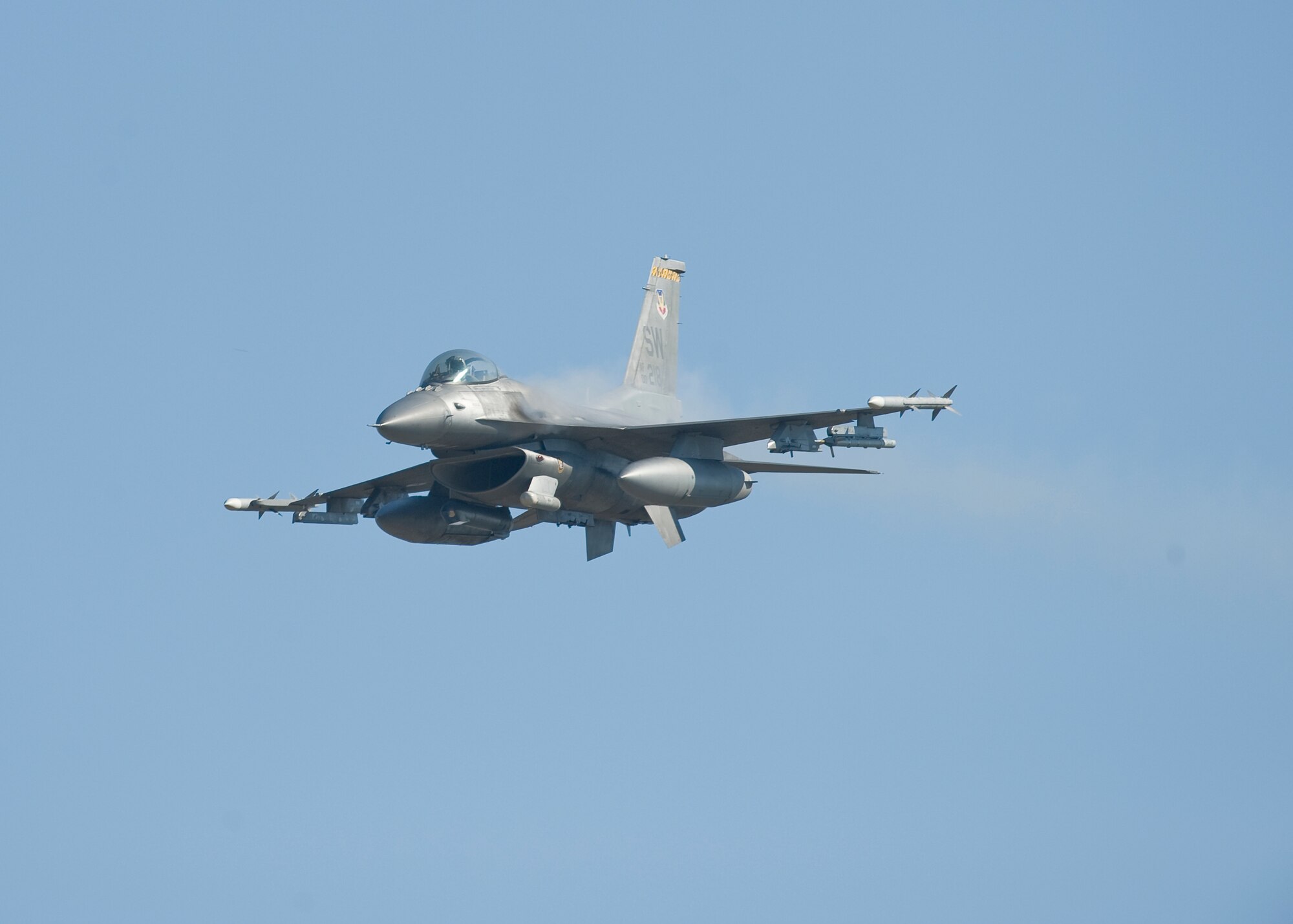 WARRIOR MILITARY OPERATIONS AREA, La. ? An F-16 Fighting Falcon from the 79th Fighter Squadron, Shaw Air Force Base, S.C., fires its 20mm M61 Vulcan six-barreled Gatling-style cannon during a training scenario near Fort Polk, La., as part of Exercise Green Flag East 11-01 Oct. 13. GFE 11-01 is a global response exercise involving Air Force and Army personnel from various bases around the country. (U.S. Air Force photo by Senior Airman Chad Warren)(RELEASED)