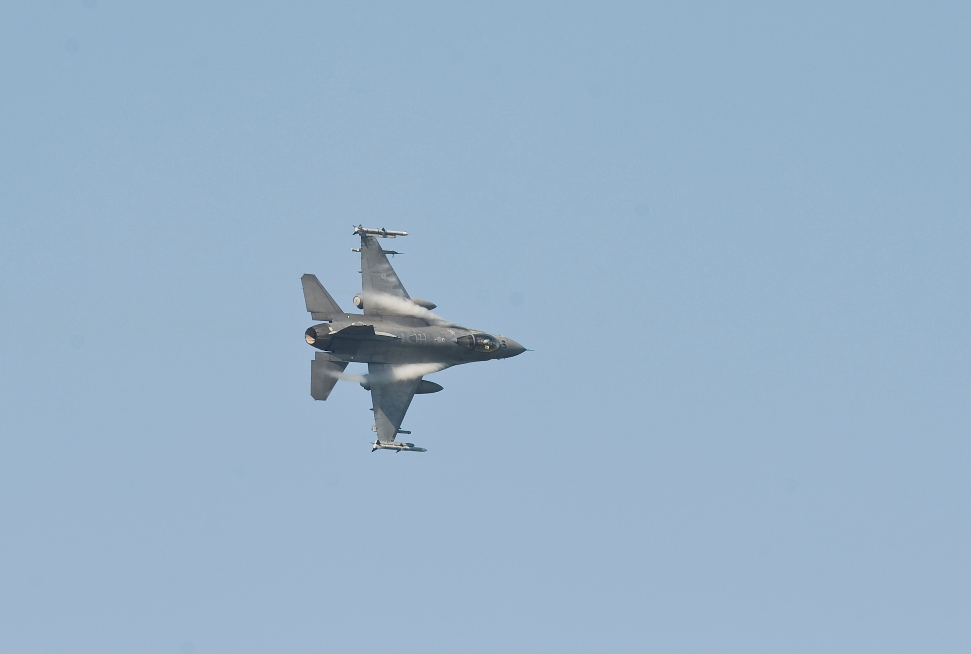 WARRIOR MILITARY OPERATIONS AREA, La. ? An F-16 Fighting Falcon from the 79th Fighter Squadron, Shaw Air Force Base, S.C., banks right during a training scenario near Fort Polk, La., as part of Exercise Green Flag East 11-01 Oct. 13. GFE 11-01 is a global response exercise involving Air Force and Army personnel from various bases around the country. (U.S. Air Force photo by Senior Airman Chad Warren)(RELEASED)