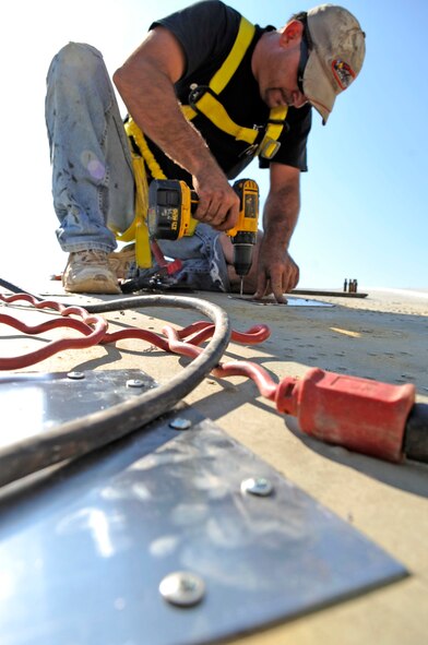 BARKSDALE AIR FORCE BASE, La. -- Contractor Greg George performs sheet-metal replacement on the Eighth Air Force Museum's B-52D bomber Oct. 20. The B-52D is going through restoration including sheet-metal replacement, cleaning and painting. This B-52D bomber has flown more than 400 missions during the Vietnam War and was used during Operation Linebacker II. (U.S. Air Force photo/Staff Sgt. John Gordinier)
