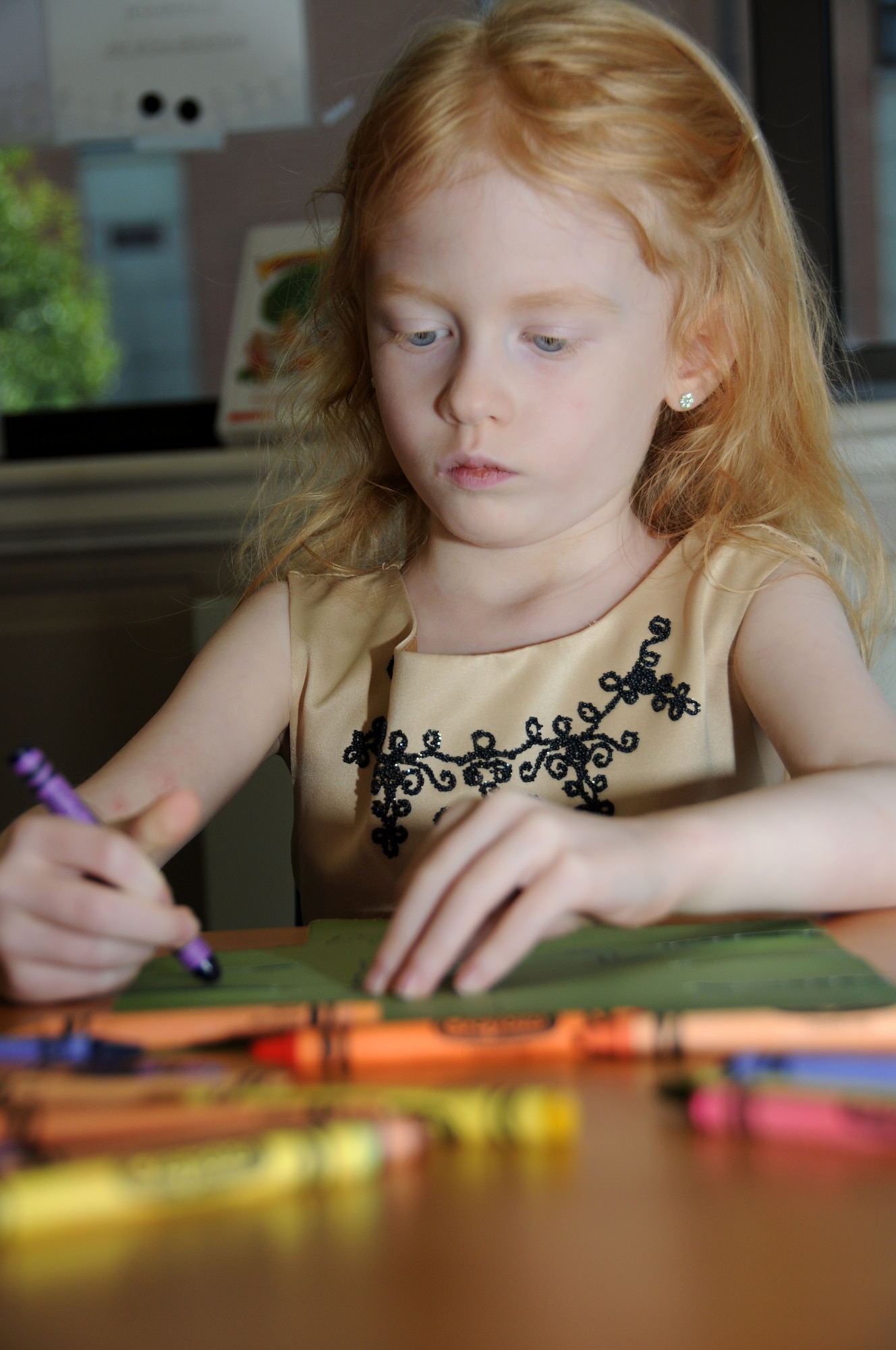 Six-year-old Milena Janton draws and colors a palm tree during one of Keesler’s
Protestant Sunday School classes, Sunday at the Triangle Chapel Annex. Milena’s parents are Tech. Sgt. Mike and Celena Janton, 338th Training Squadron. The chapel offers a wide range of religious educational programs for toddlers through senior citizens.  (U.S. Air Force photo by Kemberly Groue)