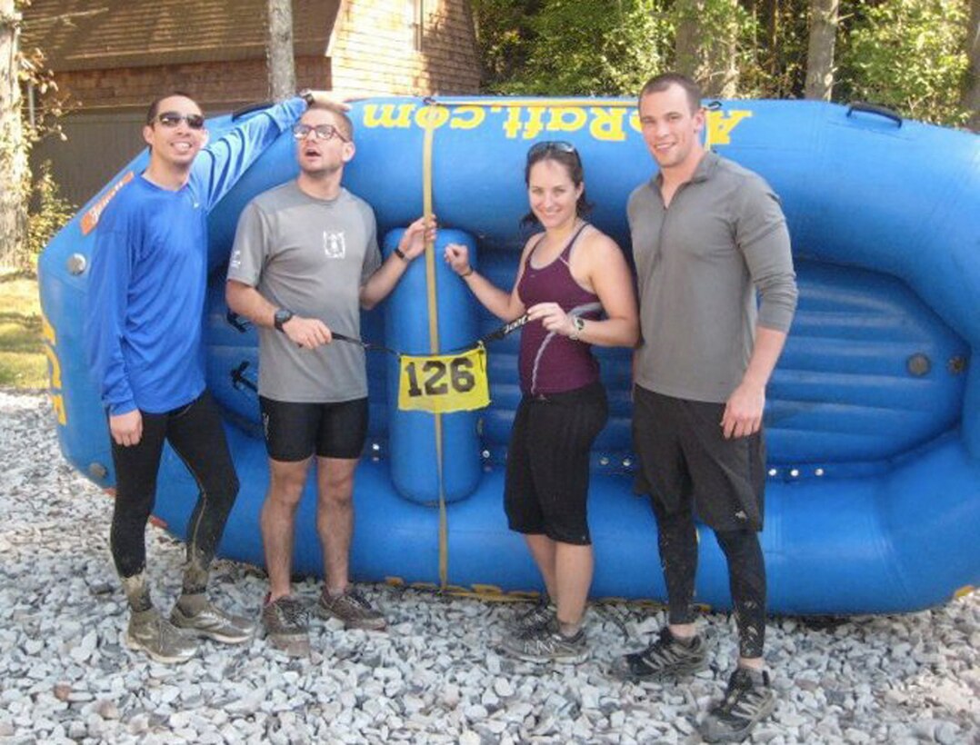 Members of the Schriever Air Force Base Wilderness Challenge adventure race team pose in front of their raft. The Schriever team claimed the Air Force first place  title and sixth place overall after completing the 52-mile course in 8:29. (Courtesy photo)
