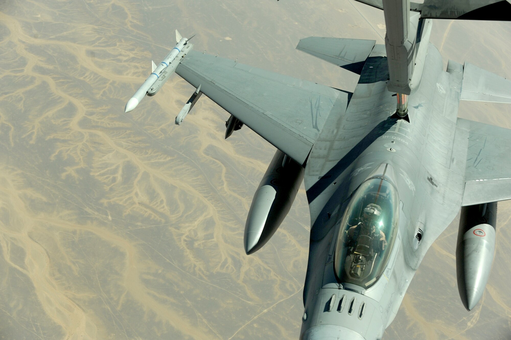 A U.S. Air Force F-16 Fighting Falcon from the 77th Fighter Squadron, at Shaw Air Force Base, S.C., receives fuel from a KC-10 Extender from the 2nd Air Refueling Squadron at Joint Base McGuire, N.J., Oct. 20, 2010, near Azraq Air Base, Jordan as part of The Falcon Air Meet 2010. The purpose of The Falcon Air Meet is to improve international military relations and joint air operations. (U.S. Air Force photo/Staff Sgt. Eric Harris) 