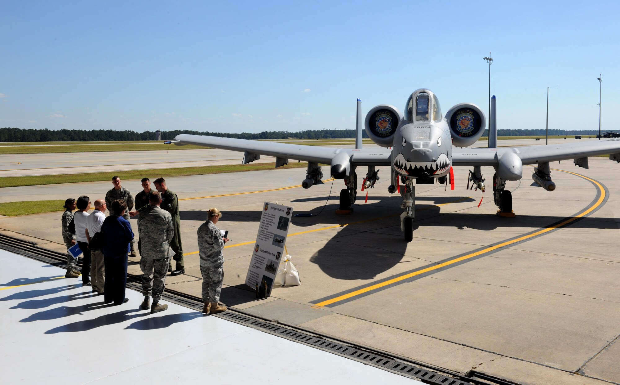 MOODY AIR FORCE BASE, Ga. -- Members from the 23rd Fighter Group answer questions from civic leaders during their visit here Oct. 18. An A-10C Thunderbolt II, HC-130P Combat King and HH-60G Pave Hawk were set on display during the visit. (U.S. Air Force photo/Airman 1st Class Benjamin Wiseman)