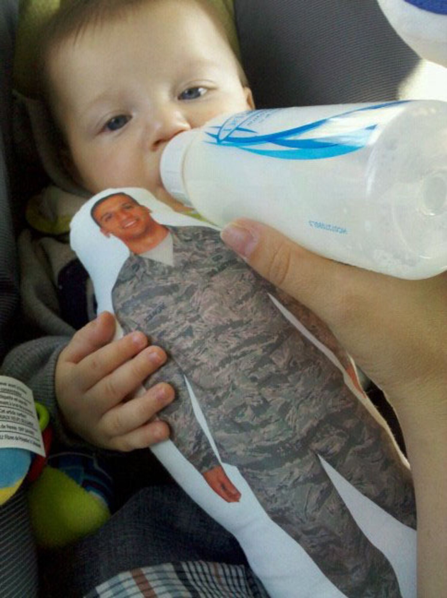 Lt. Frank Schiavone’s son, Frankie, holds the Daddy Doll, his new favorite toy. Hanscom’s Airman and Family Readiness Center provides items such as this to families of deployed servicemembers as part of its Readiness Emergency Sleeping Tools program. (Courtesy photo)