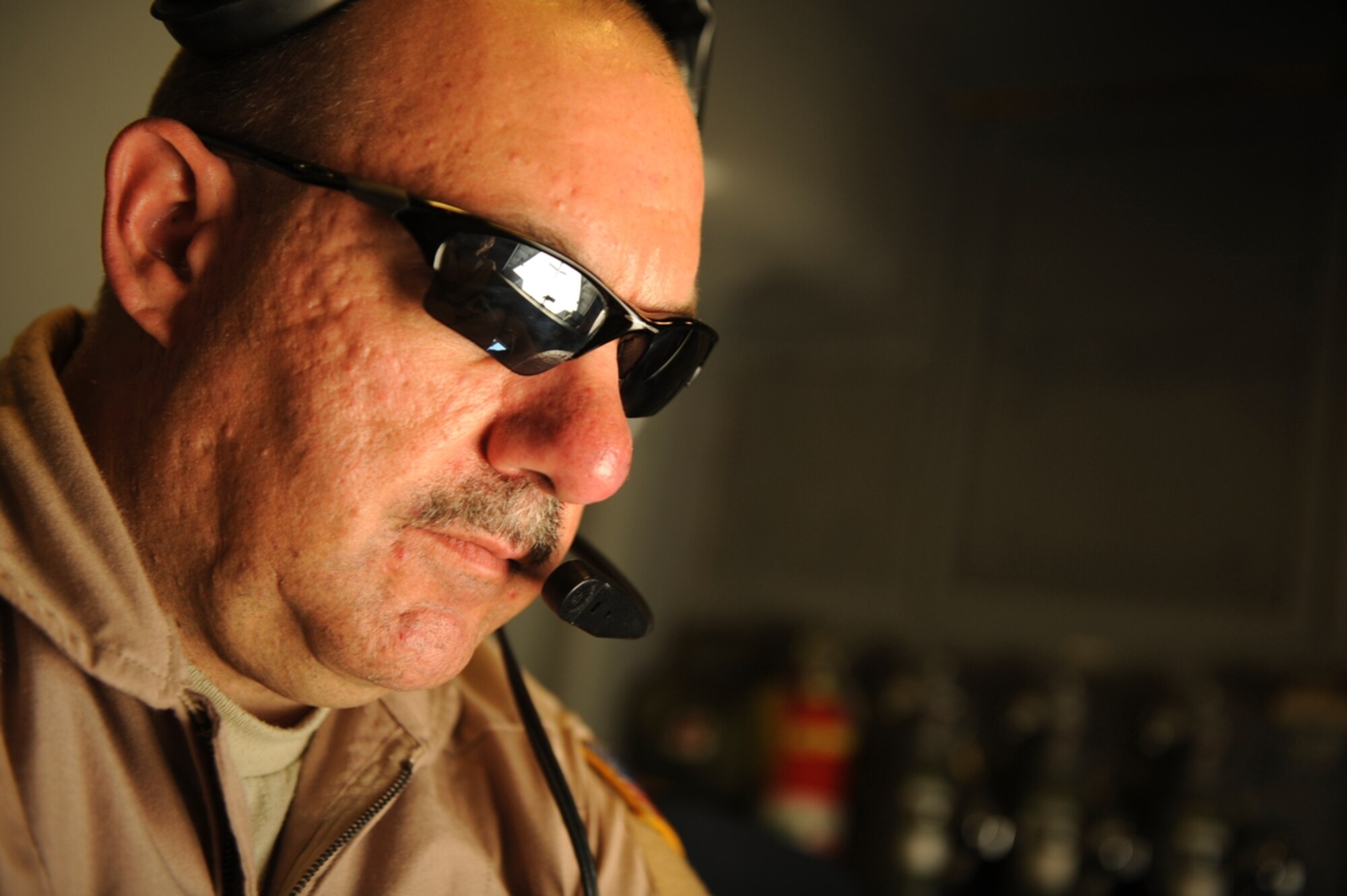 U.S. Air Force Master Sgt. Lynn Thatcher, 2nd Air Refueling Squadron, Joint Base McGuire, N.J., maneuvers the refueling boom of a KC-10 Extender to make a connection with F-16 Fighting Falcons as part of The Falcon Air Meet 2010 near Azraq Air Base, Jordan, Oct. 20, 2010.  The KC-10 refueled both U.S. Air Force and Royal Jordanian Air Force F-16s.  (U.S. Air Force Photo/Staff Sgt. Eric Harris) 
