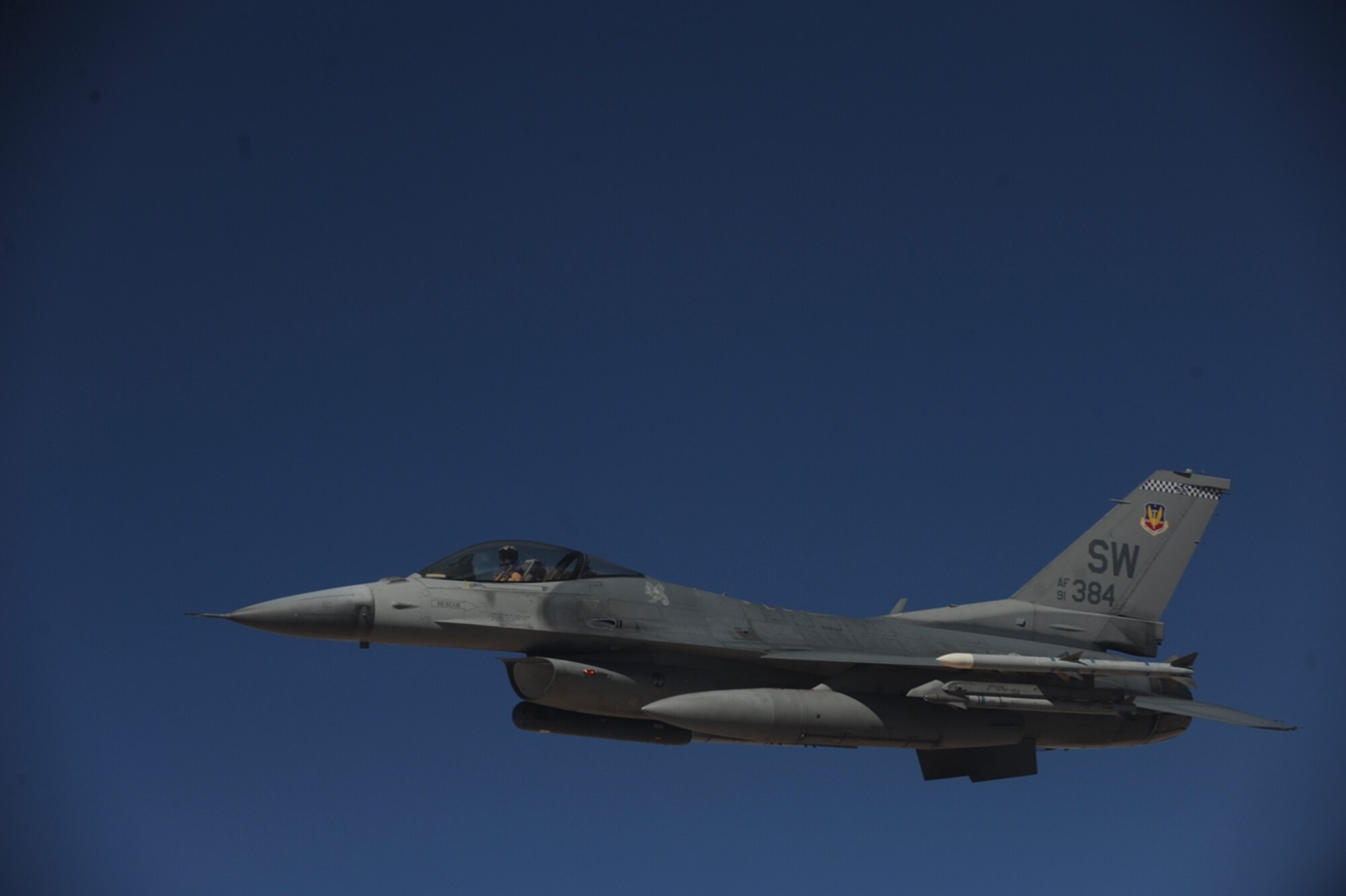A U.S. Air Force F-16 Fighting Falcon from the 77th Fighter Squadron, Shaw Air Force Base, S.C., flies in formation with a U.S. Air Force KC-10 Extender from the 2nd Air Refueling Squadron at Joint Base McGuire, N.J. after receiving fuel as part of The Falcon Air Meet 2010 near Azraq Air Base, Jordan, Oct. 20, 2010.  The U.S., Jordan and Pakistan are participating in the The Falcon Air Meet to improve international military relations and joint air operations.  (U.S. Air Force Photo/Staff Sgt. Eric Harris) 