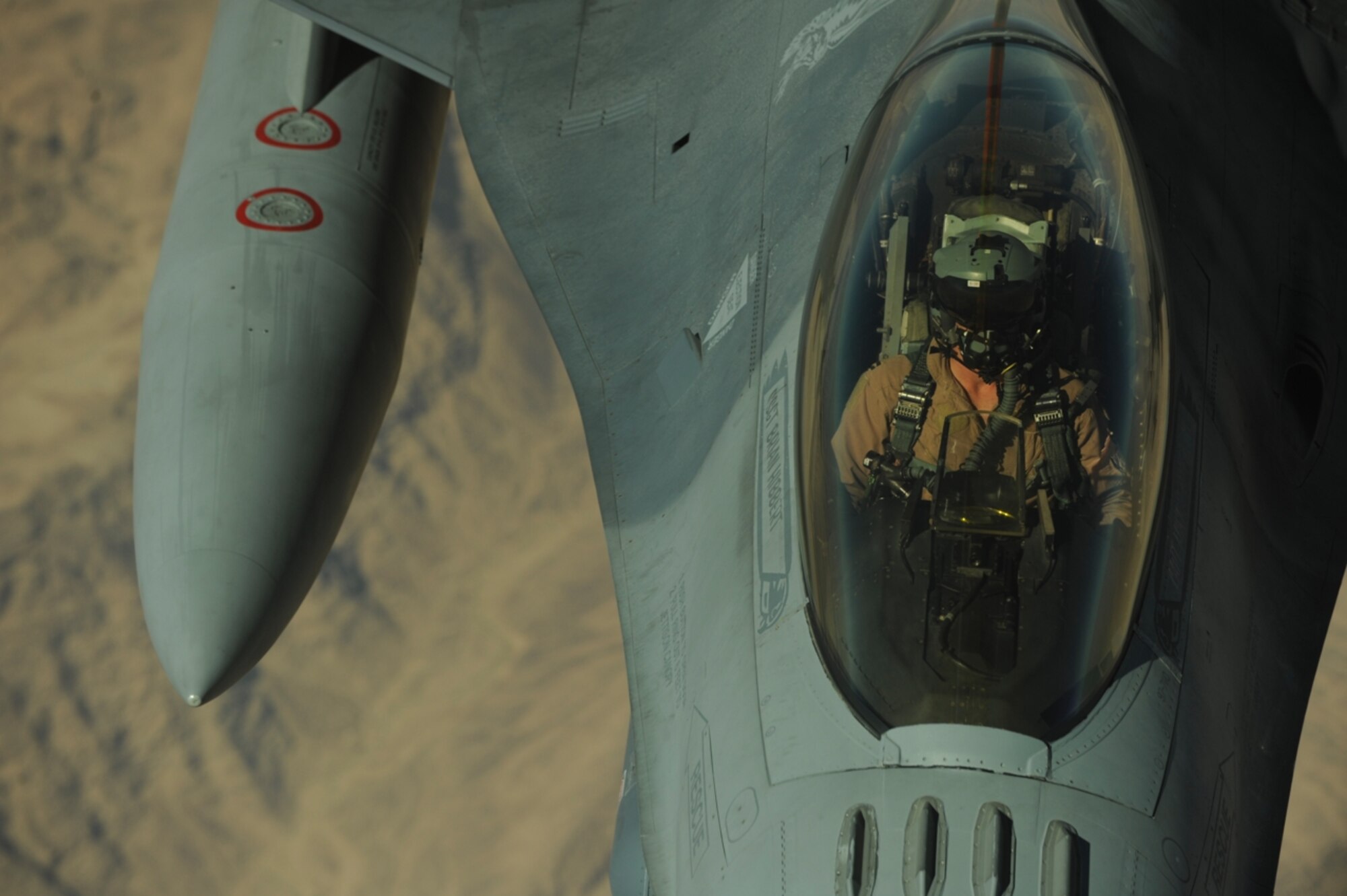 A U.S. Air Force F-16 Fighting Falcon from the 77th Fighter Squadron, Shaw Air Force Base, S.C., receives fuel from a KC-10 Extender from the 2nd Air Refueling Squadron, Joint Base McGuire, N.J., as part of The Falcon Air Meet 2010 near Azraq Air Base, Jordan, Oct. 20, 2010.  The purpose of The Falcon Air Meet is to improve international military relations and joint air operations.  (U.S. Air Force Photo/Staff Sgt. Eric Harris)