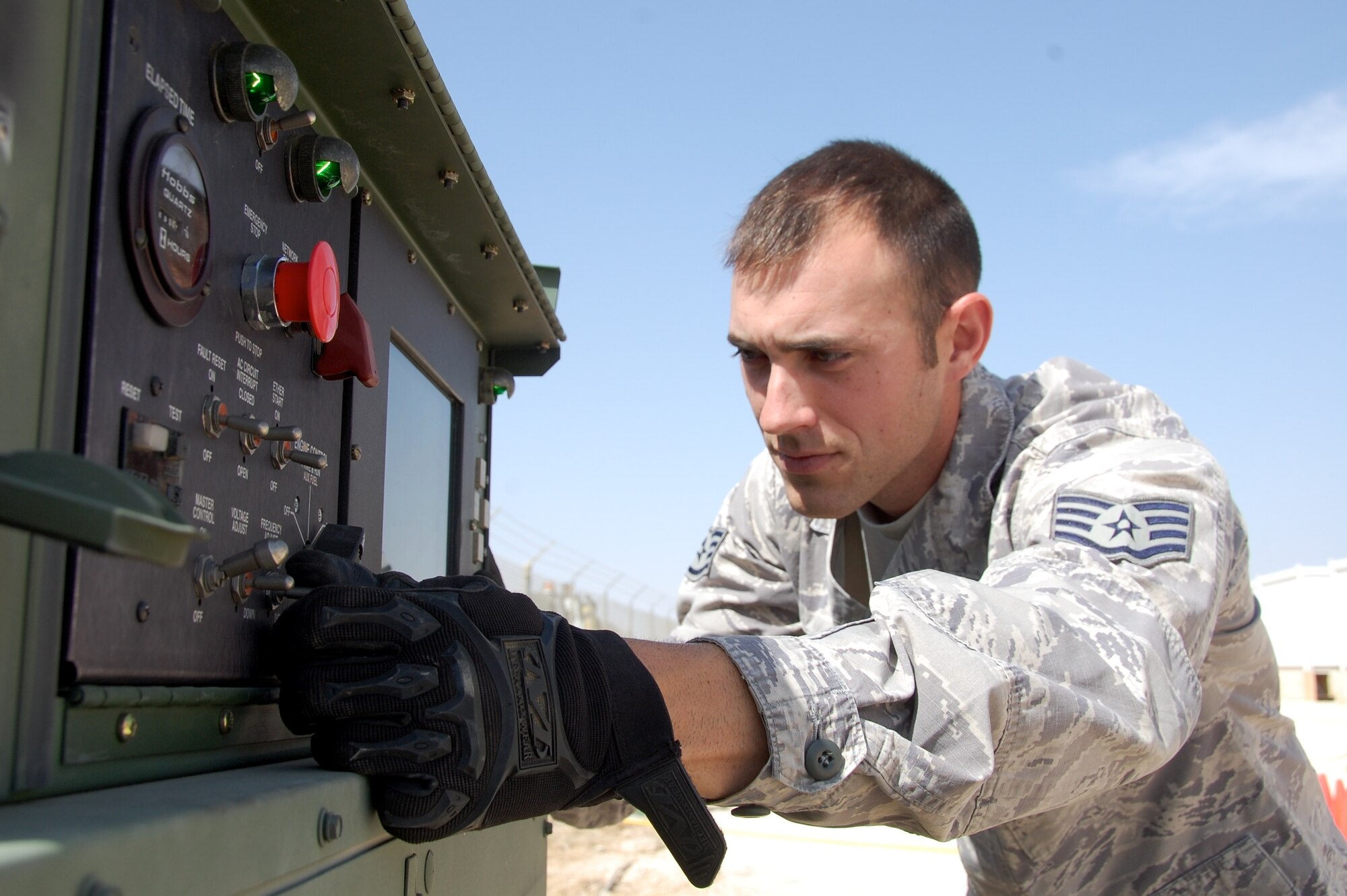 Staff Sgt Josh R. Arnett, 28,  a native of Elizabethton, Tenn., is participating in Falcon Air Meet 2010 in Jordan. A member of the 5th Combat Communications Group out of Warner-Robbins AFB, GA, Arnett is responsible for keeping the power generators running 24/7 at this bare base location. The generators provide critical power to the U.S. compounds communication systems. (U.S. Air Force Photo by Mr. Alan Black)