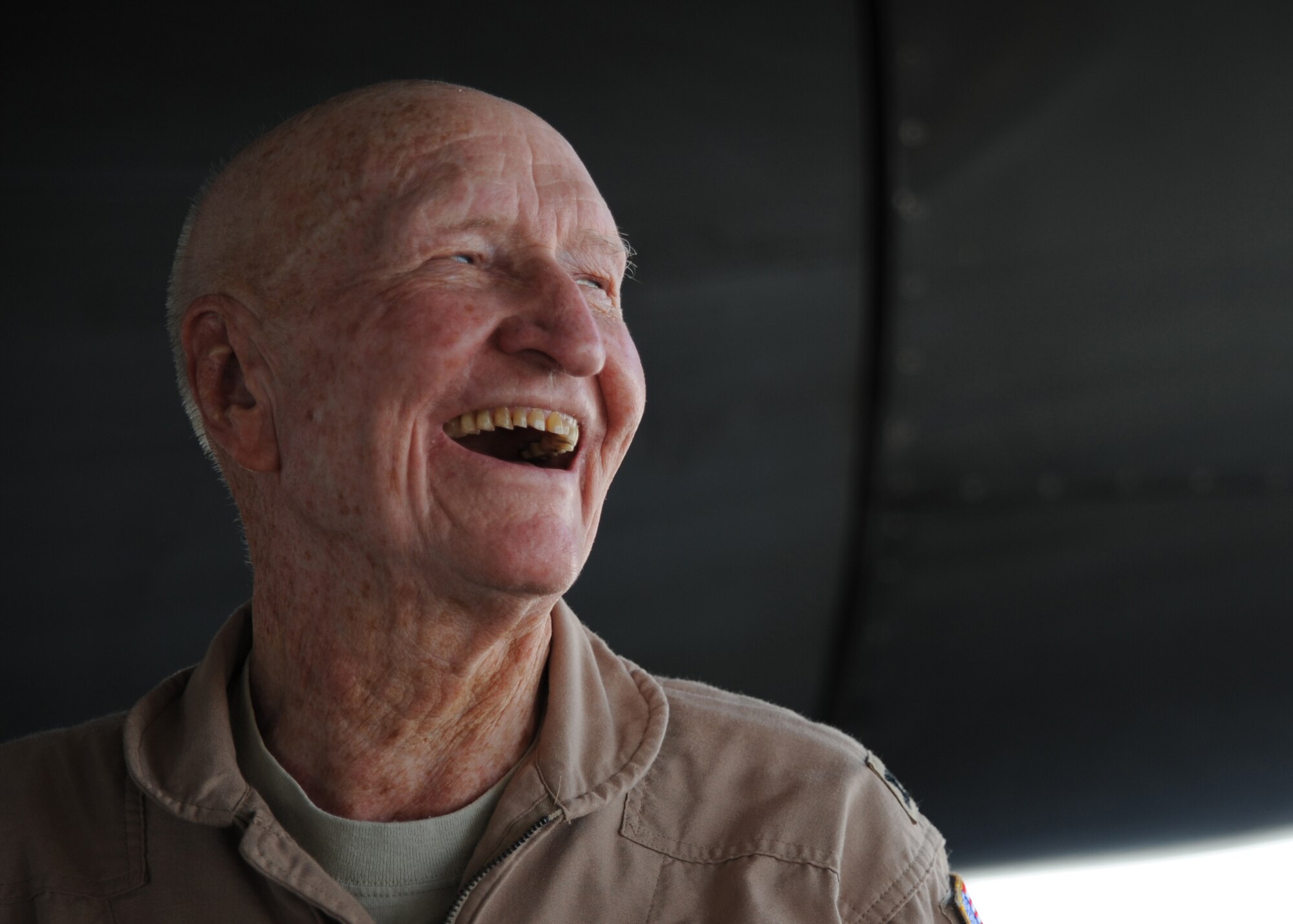 Retired Col. Gail Halvorsen laughs at a joke during his B-1B tour at an undisclosed location in Southwest Asia, Oct. 21. Colonel Halvorsen is best known as the "Candy Bomber." (U.S. Air Force photo/Senior Airman Katie Gieratz)(RELEASED) 