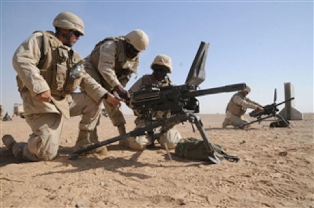 U.S. Navy Seabees with Naval Mobile Construction Battalion 5 setup MK-19 grenade launchers during a crew-served weapons qualification range at Camp Leatherneck, Helmand province, Afghanistan, on Oct. 16, 2010.  The battalion was deployed to Afghanistan to execute general engineering, infrastructure construction and project management in support of Operation Enduring Freedom.  