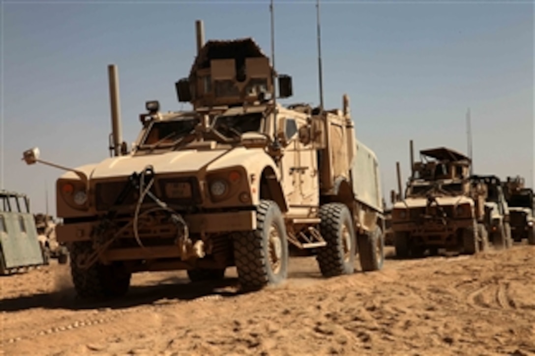 U.S. Marines from Lima Company, 3rd Battalion, 5th Marine Regiment, Regimental Combat Team 2 conduct convoy operations in Sangin Valley, Afghanistan, on Oct. 12, 2010.  The mission of the 3rd Battalion is to conduct counterinsurgency operations in partnership with the International Security Assistance Force.  