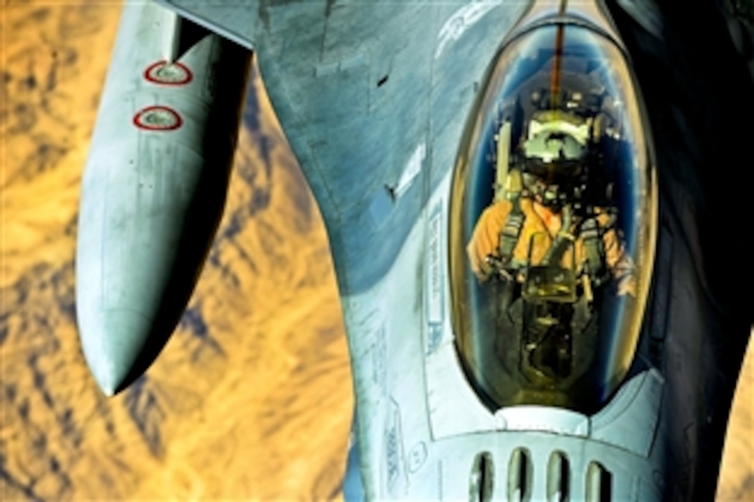 A U.S. Air Force F-16 Fighting Falcon receives fuel from a KC-10 Extender as part of the annual Falcon Air Meet near Azraq Air Base, Jordan, Oct. 20, 2010. The F-16 is part of the 77th Fighter Squadron on Shaw Air Force Base, S.C. The KC-10 is from the 2nd Air Refueling Squadron based on Joint Base McGuire, N.J.
