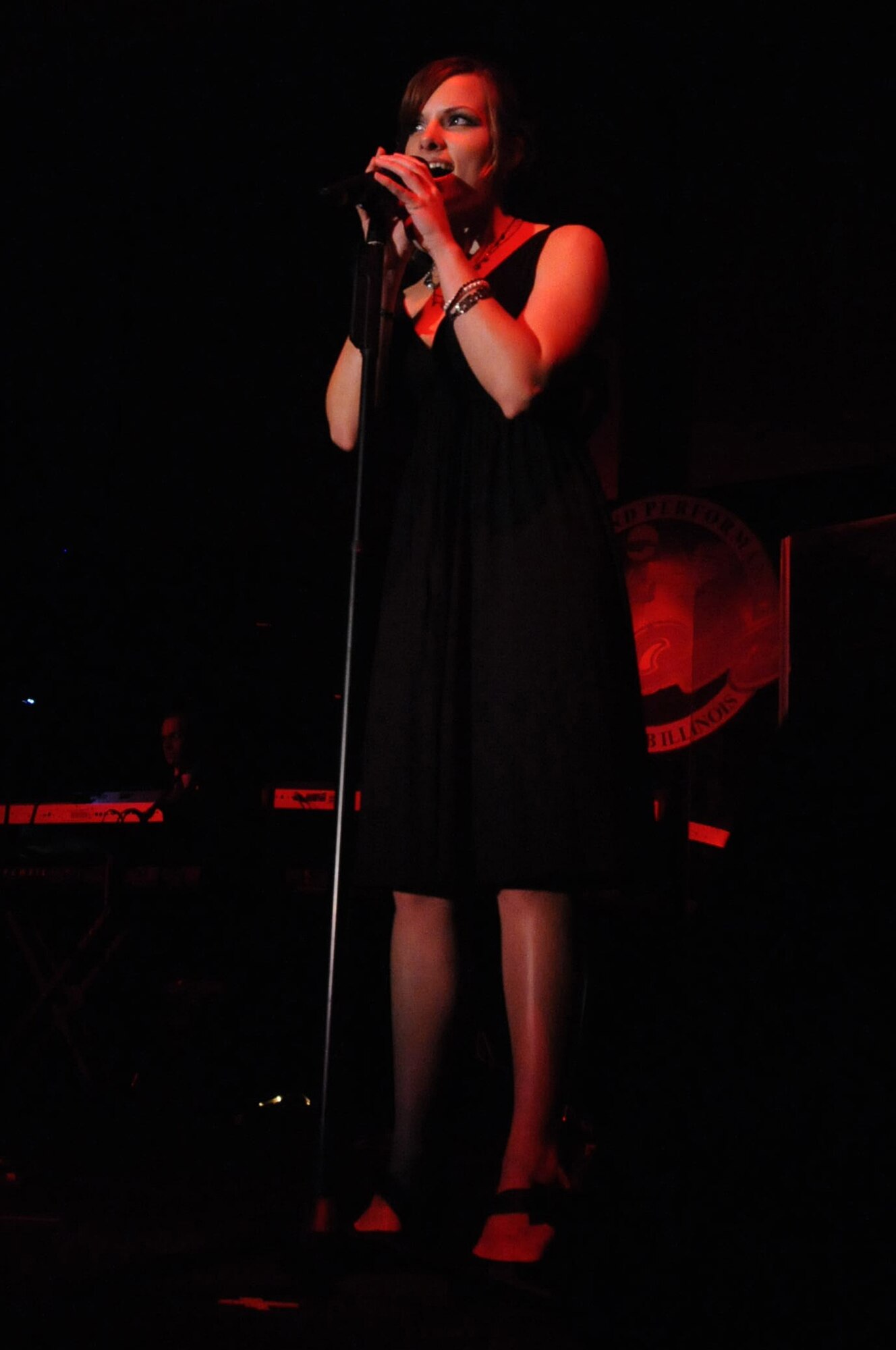 Senior Airman Rachel Kleist, McChord AFB, performed "At Last" at the Scott Club during the Air Mobility Command Icon on Thursday, Aug. 21, 2010. This is the second year in a row that Airman Kleist has been a finalist at AMC Icon. (Photo by Tech. Sgt. Michelle Larche)
