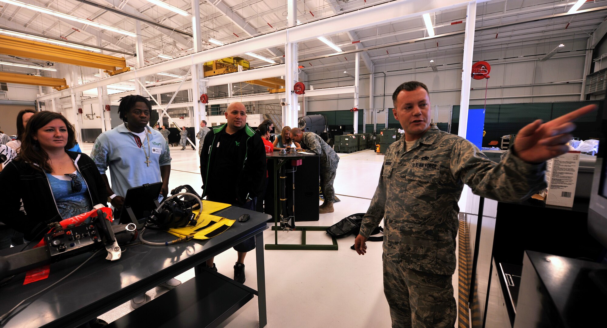 MOODY AIR FORCE BASE, Ga. -- Staff Sgt. Jeremy Johnson, 23rd Component Maintenance Squadron aircraft fuels system craftsman, gives Moody spouses a glimpse at what his job here Oct. 22. Sergeant Johnson gave insight to his career during the 23rd Maintenance Group’s Spouse Orientation Day. (U.S. Air Force photo/Airman 1st Class Joshua Green)
