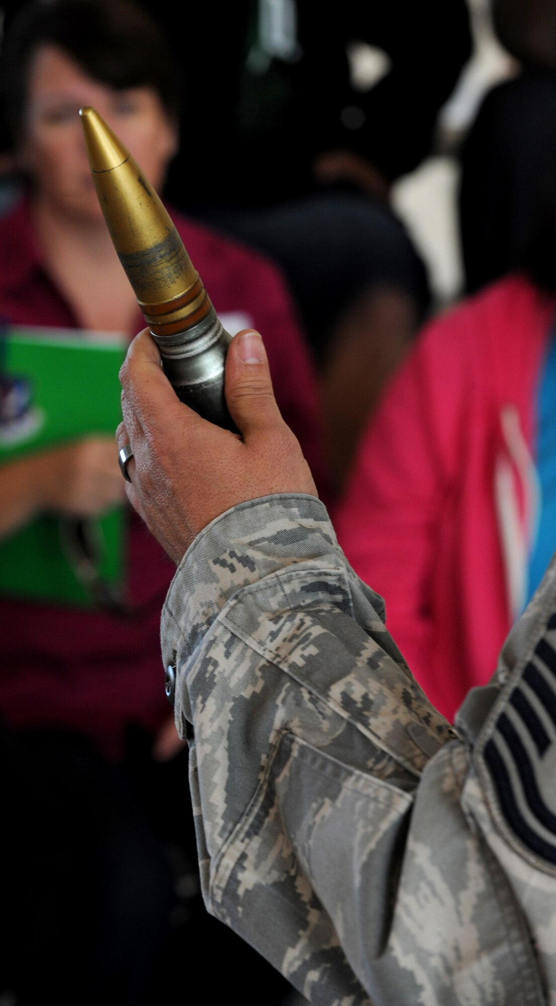 MOODY AIR FORCE BASE, Ga. -- A bullet from an A-10C Thunderbolt II aircraft is shown as part of a demonstration held during the 23rd Maintenance Group Spouse’s Orientation Day here Oct. 22. Military spouses were invited to base to learn what their spouses do on a day to day basis. (U.S. Air Force photo/Airman 1st Class Benjamin Wiseman) 