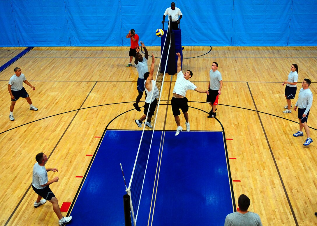 DYESS AIR FORCE BASE, Texas—Dyess Airmen compete against the Dyess Chiefs in volleyball during the Dyess Olympics Oct. 22 at the fitness center here. Dyess Olympics takes place each year to promote fun and boost moral for the base. It includes sports such as volleyball, base ball, basketball and more. (U.S. Air Force photo/ Airman 1st Class Brittney Smolinski)
