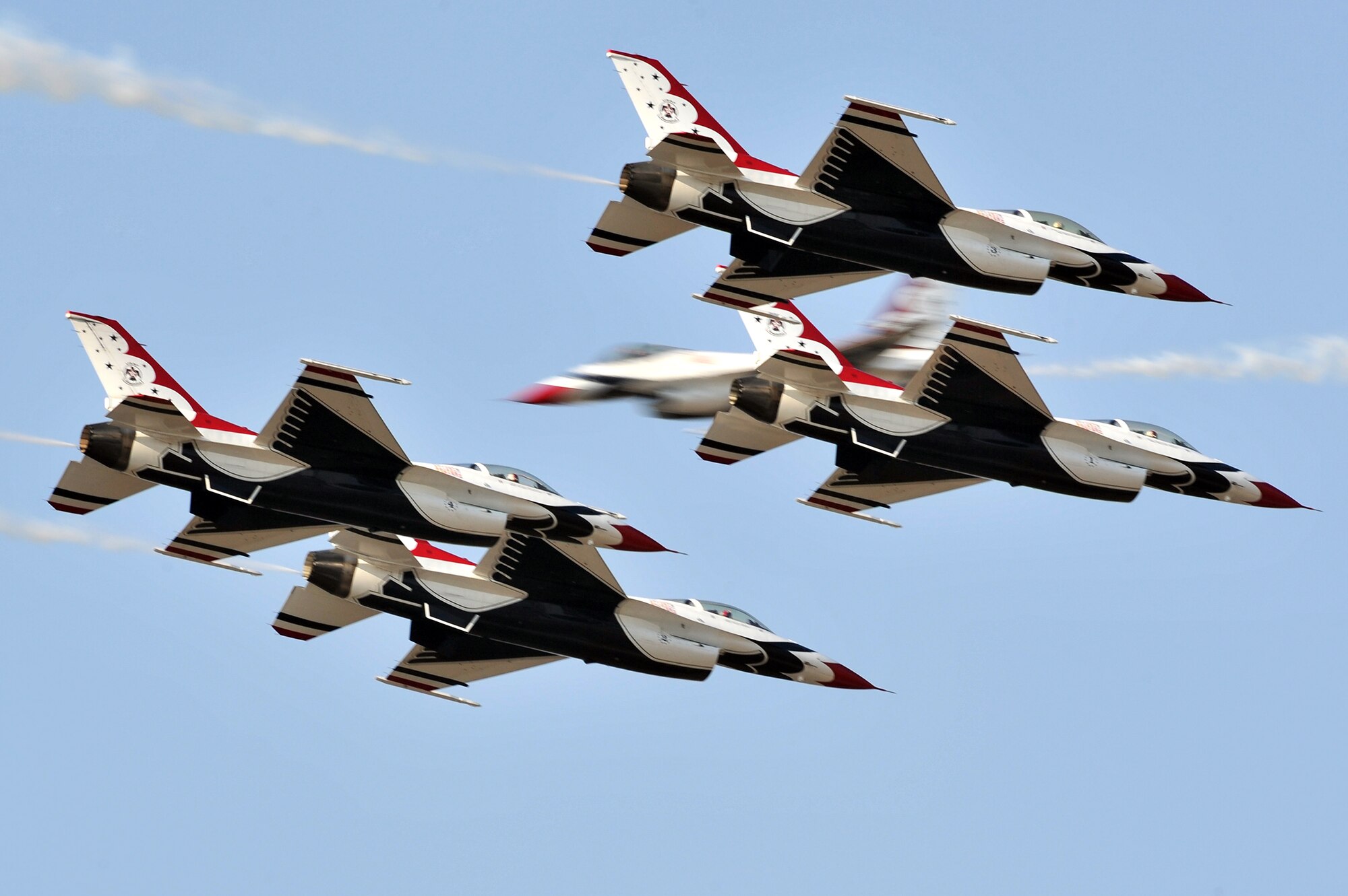 The Air Force Thunderbirds fly over Little Rock Air Force Base Oct. 10 during the air show and open house. The team demonstrated the capabilities of Air Force pilots and the F-16C Fighting Falcon. (U.S. Air Force photo by Staff Sgt. Chris Willis)