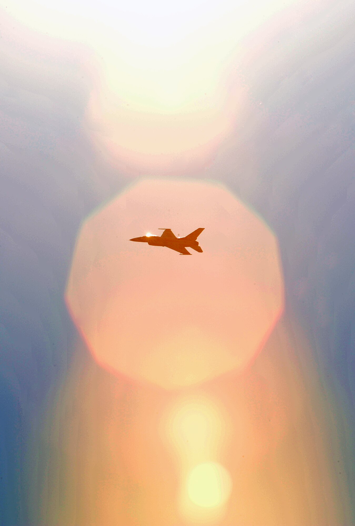 An Air Force Thunderbird fly's over Little Rock Air Force Base Oct. 9 during the air show and open house. The team demonstrated the capabilities of Air Force pilots and the F-16C Fighting Falcon. (U.S. Air Force photo by Staff Sgt. Chris Willis)