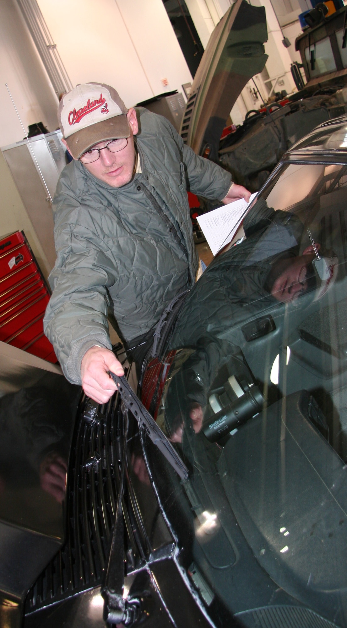 Tech. Sgt. Lloyd Fletcher-Boggs, 341st Logistics Readiness Squadron technical support specialist, checks a windshield wiper for wear during a free privately owned vehicle inspection Oct. 17 at building 870. The Airmen of the vehicle maintenance section will be on hand again Oct. 23 and 24 from 8 a.m. to 12 p.m. to inspect POVs. (U.S. Air Force photo/Staff Sgt. Dillon White)