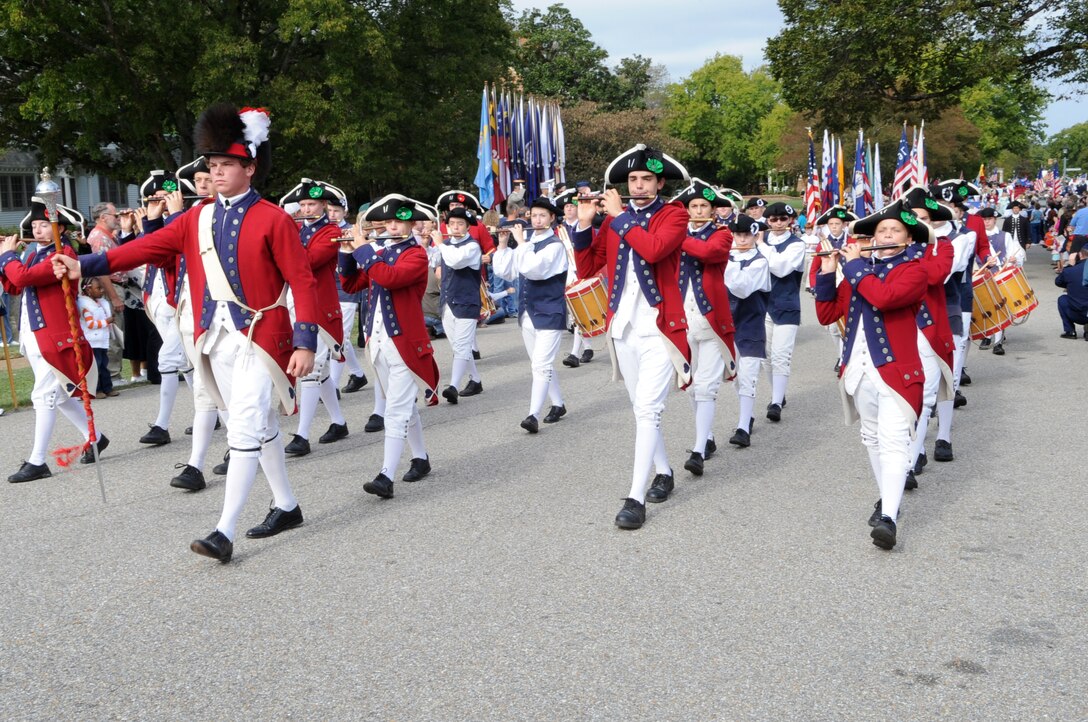 YORKTOWN, Va. -- A local high school band dressed in colonial garb march on during the Yorktown Day parade Oct 19. The parade commemorated the Battle of Yorktown, which brought an end to the American Revolutionary War. (U.S. Air Force Photo/Staff Sgt. Christina M. Styer)