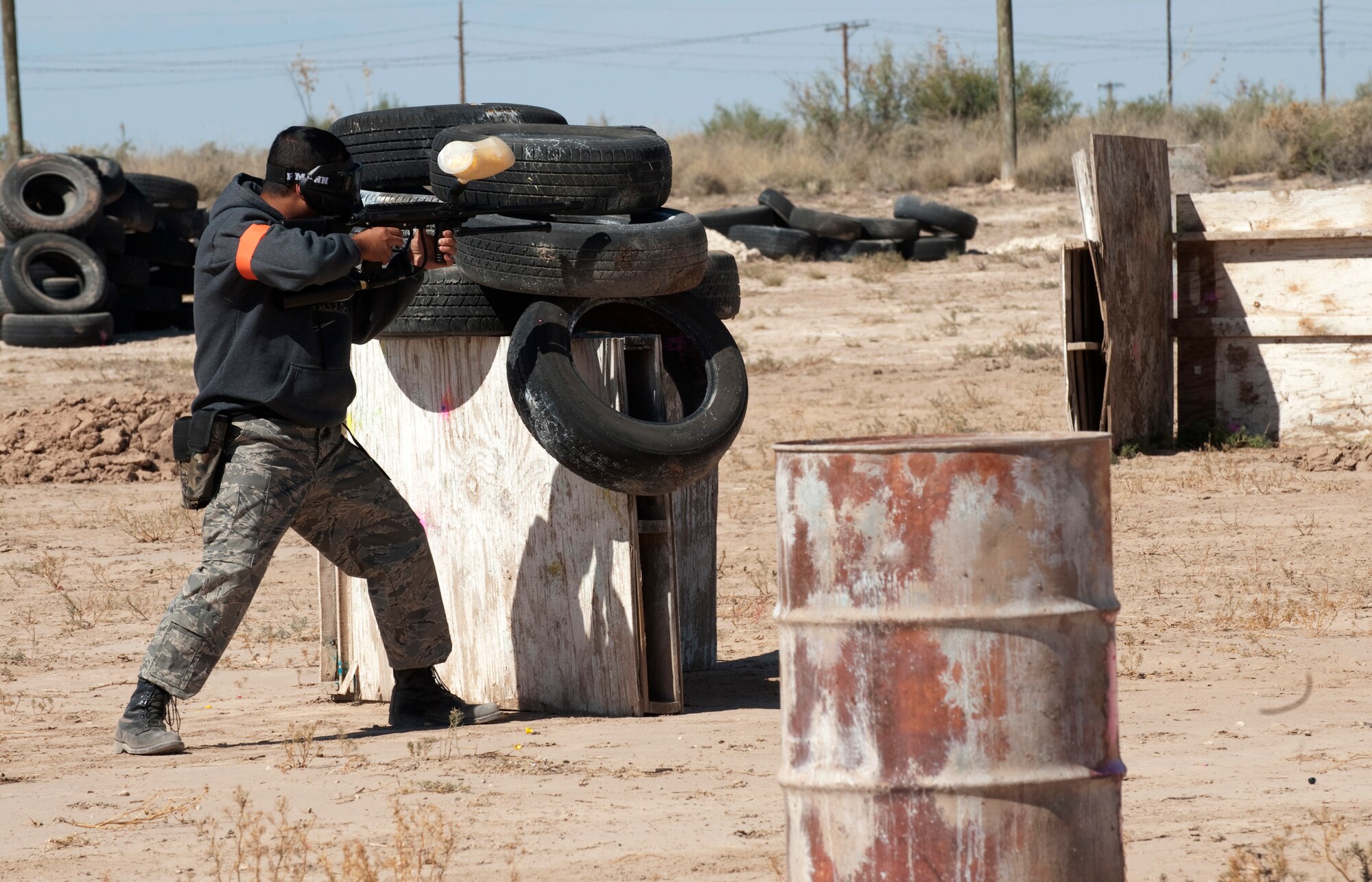 HOLLOMAN AIR FORCE BASE, N.M. -- Maj. Jerry Ridgway, 6th Reconnaissance Squadron, prepares to fire during a paintball competition at the Apache Sports Range Oct. 19, 2010. The competition was hosted by the 6th RS and the 29th Attack Squadron. The goal for the competition was to build unit morale and to educate people on firearm safety. (U.S. Air Force photo by Airman 1st Class Joshua Turner/Released)