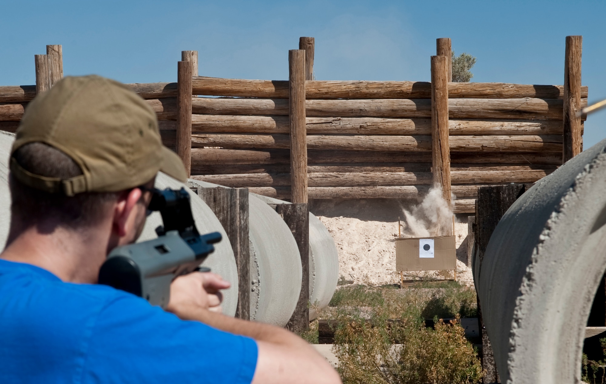 HOLLOMAN AIR FORCE BASE, N.M. -- Maj. Eric Hendrickson, 6th Reconnaissance Squadron, fires his rifle during a competition Oct. 19, 2010. The competition was hosted by the 6th RS and the 29th ATKS, and they were joined by members of associate units to compete for the title of pistol champion, rifle champion, shotgun champion and three-gun champion -- a combination of pistol, rifle and shotgun. The primary goal of the competitions was to build unit morale and to educate people on firearm safety. (U.S. Air Force photo by Airman 1st Class Joshua Turner/Released)