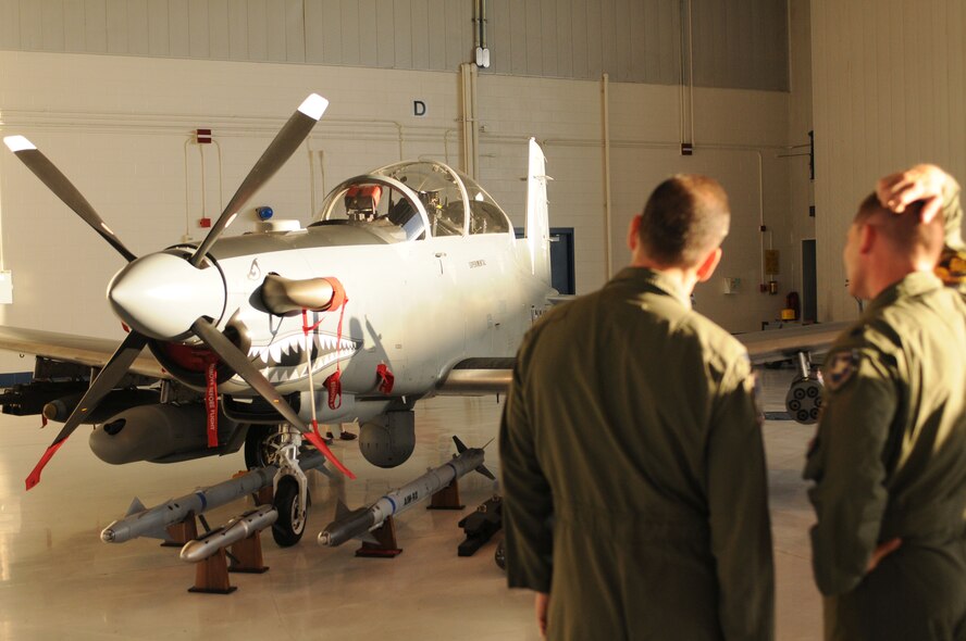 Guard and Reserve warfighters get a close up look at an experimental AT-6C light attack aircraft during the Weapons and Tactics Conference held at Tucson International Airport Oct. 18-22. The Air National Guard, Air Force Reserve Command Test Center, which hosted the conference, is currently testing light attack capabilities for several Air Force mission areas. (US Air Force photo/Maj. Gabe Johnson)