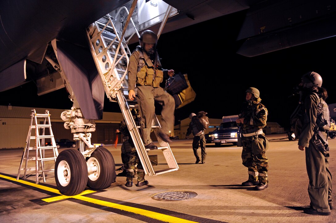 ELLSWORTH AIR FORCE BASE, S.D. – Capt. Mike Fessler, 34th Bomb Squadron pilot, exits a B-1B Lancer during a Phase II Operational Readiness Inspection, Oct. 14.  The 34th BS flew multiple missions throughout the six-day inspection period. (U.S. Air Force photo/Staff Sgt. Marc I. Lane)