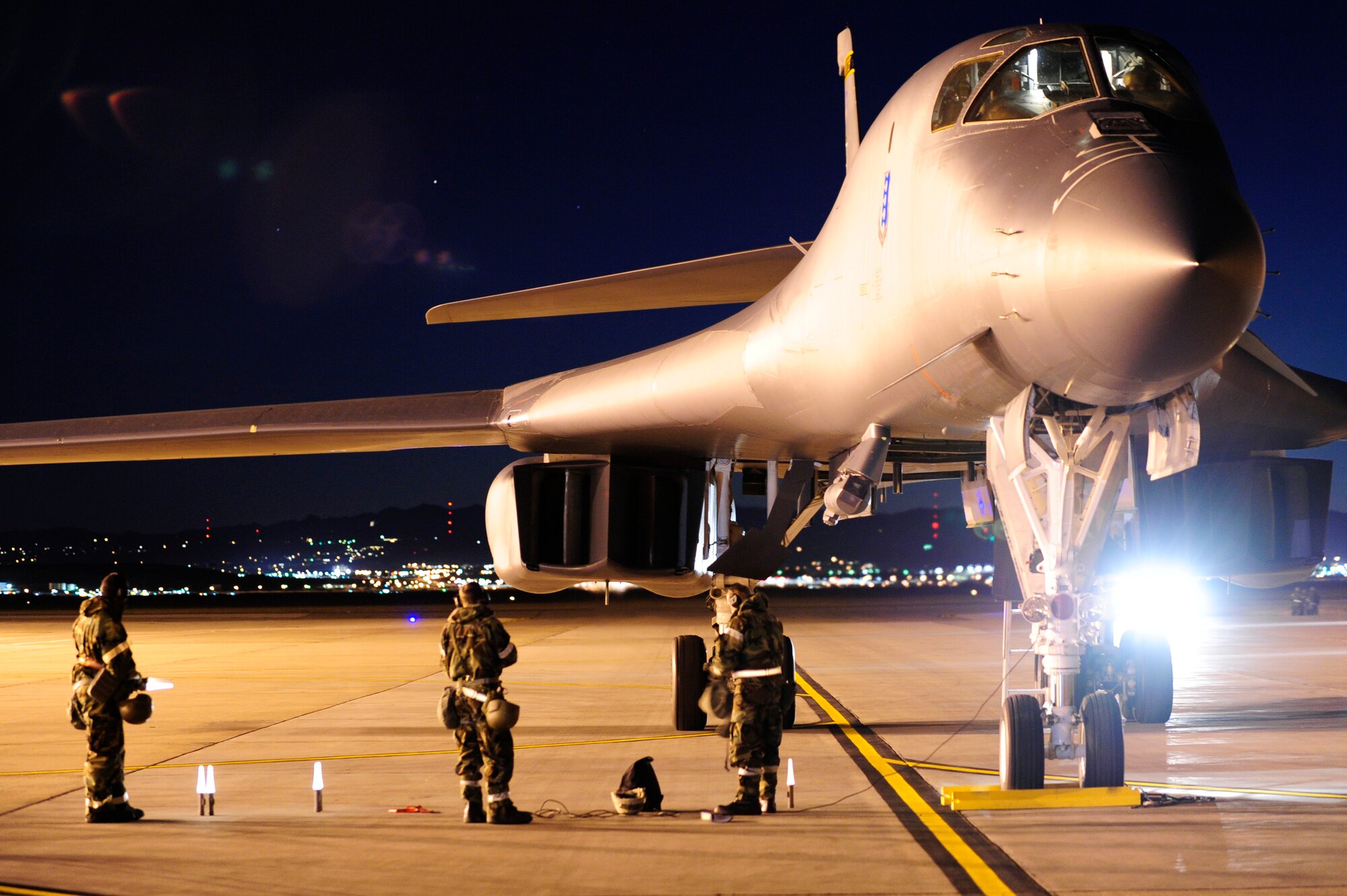 ELLSWORTH AIR FORCE BASE, S.D. – Airmen of the 28th Aircraft Maintenance Squadron prepare to tow a B-1B Lancer during a Phase II Operational Readiness Inspection, Oct. 14. During the ORI, Airmen are tested on their skills and abilities while in a simulated-deployed environment. (U.S. Air Force photo/Staff Sgt. Marc I. Lane)