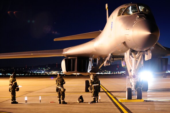 ELLSWORTH AIR FORCE BASE, S.D. – Airmen of the 28th Aircraft Maintenance Squadron prepare to tow a B-1B Lancer during a phase II operational readiness inspection, Oct. 14. During the ORI, Airmen are tested on their skills and abilities while in a simulated deployed environment. (U.S. Air Force photo/Staff Sgt. Marc I. Lane)