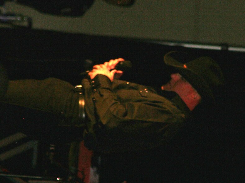 Staff Sgt. Tim Herrman, from Scott Air Force Base, Ill., sings during the Air Mobility Command Icon competition at Scott AFB on Oct. 21, 2010. Sergeant Johnson was the base-level winner at Scott and was among 11 competitors who sang for the right to earn the title of "AMC Icon." (U.S. Air Force Photo/Master Sgt. Scott T. Sturkol)