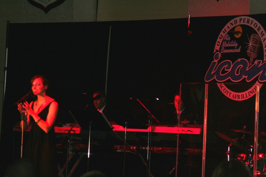 Senior Airman Rachel Kleist, from Joint Base Lewis-McChord, Wash., sings during the Air Mobility Command Icon competition at Scott Air Force Base, Ill., on Oct. 21, 2010. Airman Kleist was the base-level winner at Joint Base L-M and was among 11 competitors who sang to earn the title of "AMC Icon." (U.S. Air Force Photo/Master Sgt. Scott T. Sturkol)