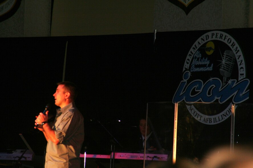 Staff Sgt. Clint Yager, from Little Rock Air Force Base, Ark., sings during the Air Mobility Command Icon competition at Scott Air Force Base, Ill., on Oct. 21, 2010. Sergeant Yager was the base-level winner at Little Rock and competed with 10 other competitors for the title of "AMC Icon." (U.S. Air Force Photo/Master Sgt. Scott T. Sturkol)