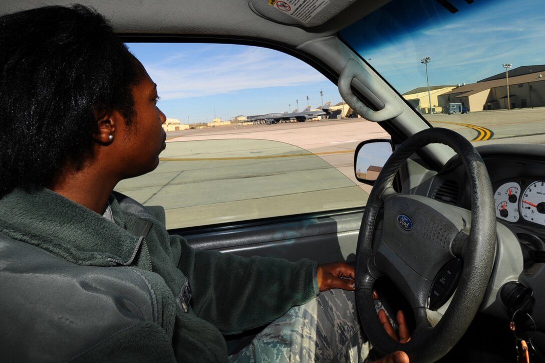 ELLSWORTH AFB, S.D. – Staff Sgt. Tiffany Davis, 28th Operations Support Squadron airfield management NCO in-charge of training, checks the flightline as part of a daily inspection, Oct. 19. Sergeant Davis looks for anything which might disturb operations on the flightline, and coordinates with appropriate agencies to fix any issues she finds. The Airfield Management Office plays a vital role in maintaining safety on the airfield by handling the removal or dispersal of birds or wildlife, managing and inspecting the airfield. (U.S. Air Force photo/Senior Airman Kasey Close)