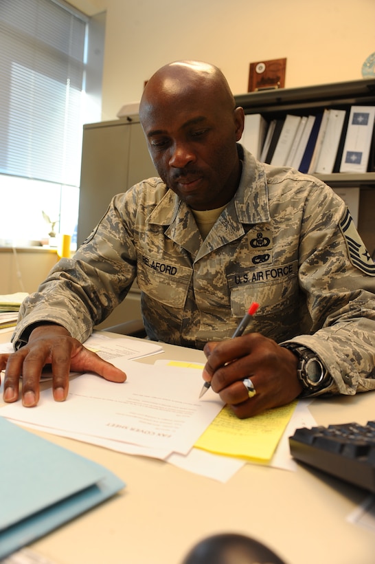 ELLSWORTH AFB, S.D. – Senior Master Sgt. Warren Relaford, 28th Operations Support Squadron airfield manager, reviews a notice to Airmen for an upcoming warrior fly-by, Oct. 19. The warrior fly-by is a way for the 28th Bomb Wing to enhance esprit de corp within the wing. (U.S. Air Force photo/Senior Airman Kasey Close)