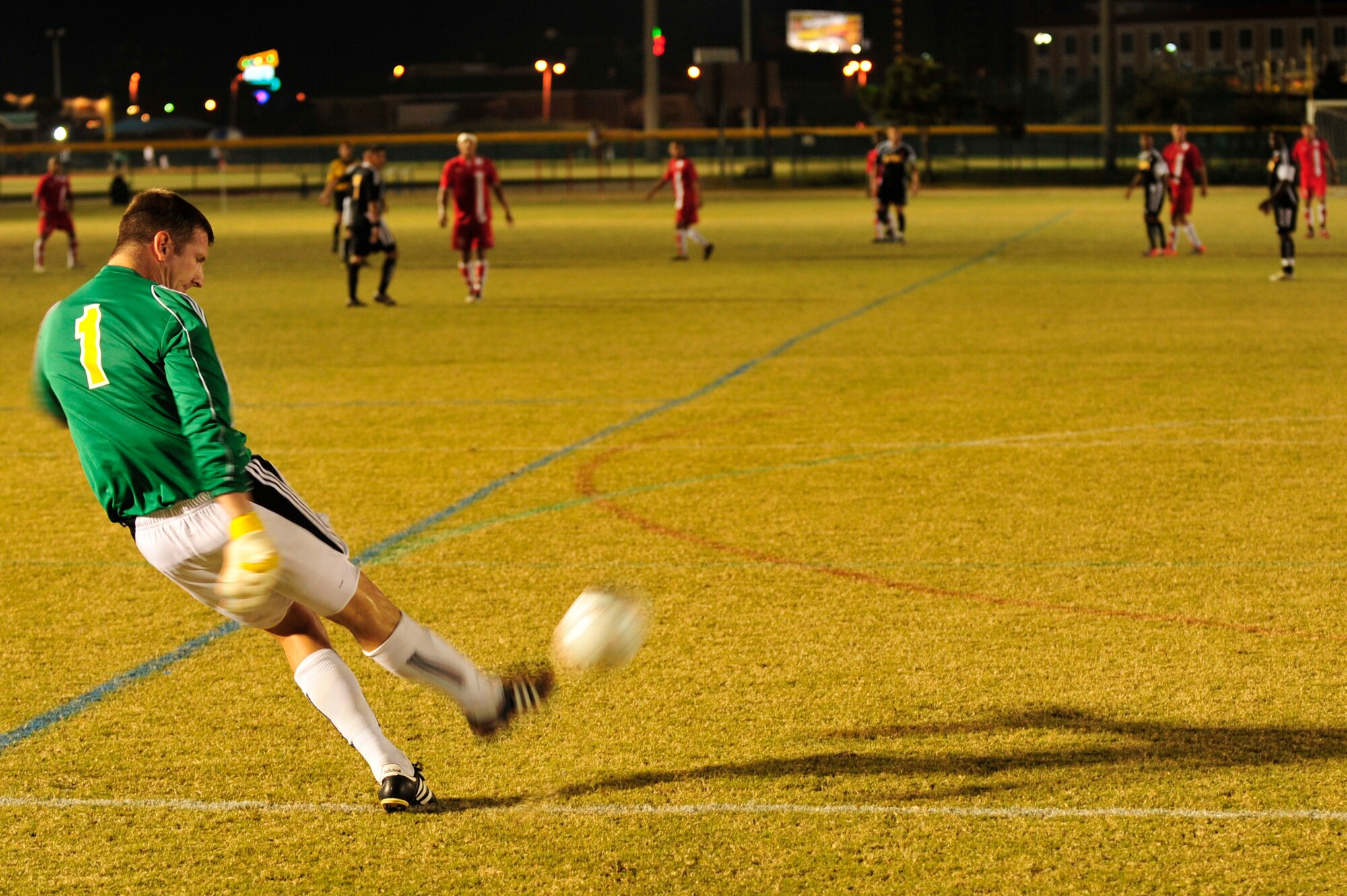U.S. Army Capt. Matthew Wesmiller, goalie for the USA soccer team, kicks the ball back into play during an Armed Forces Men's Soccer Championship Round Robin match against the U.S. Marine Corps at Morgan Sports Complex, Destin, Fla., Oct. 20, 2010. The Armed Forces Championships are conducted by the Armed Forces Sports council for the purpose of promoting, understanding, goodwill, and competition among the Armed Services. Capt. Wesmiller is stationed at Ansbach, Germany. (DoD Photo by Staff Sgt. Stephanie Jacobs/RELEASED)
