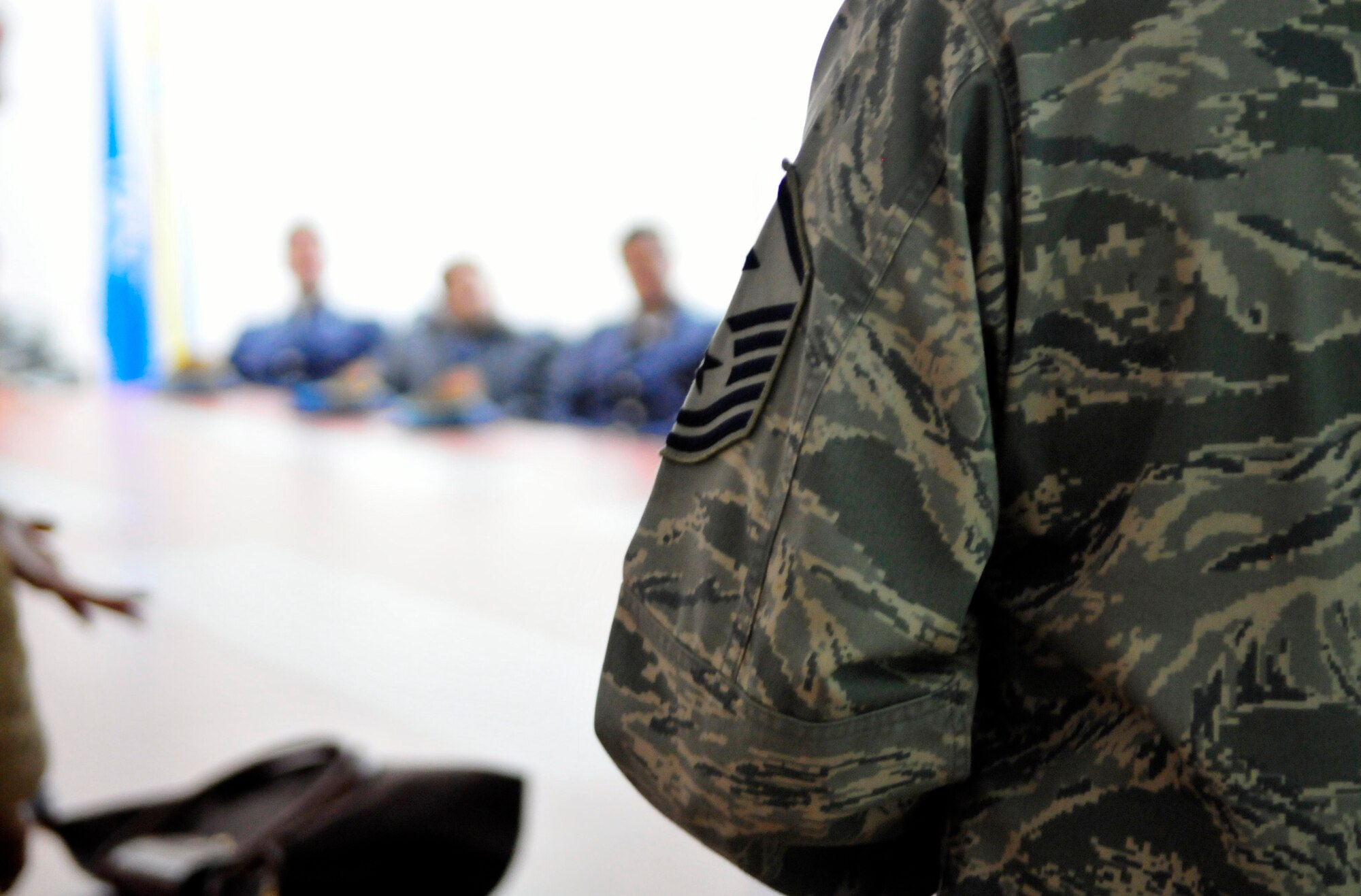 U.S. Air Force 1st Sergeants John Carbon and Michael Patrick mentor members of the Bulgarian Air Force on the roles and responsibilities of airmen during an enlisted leadership seminar during Thracian Fall 2010 at Ignatievo Air Base, Bulgaria, Oct. 21. (U.S. Air Force photo by Tech. Sgt. Michael Voss)  