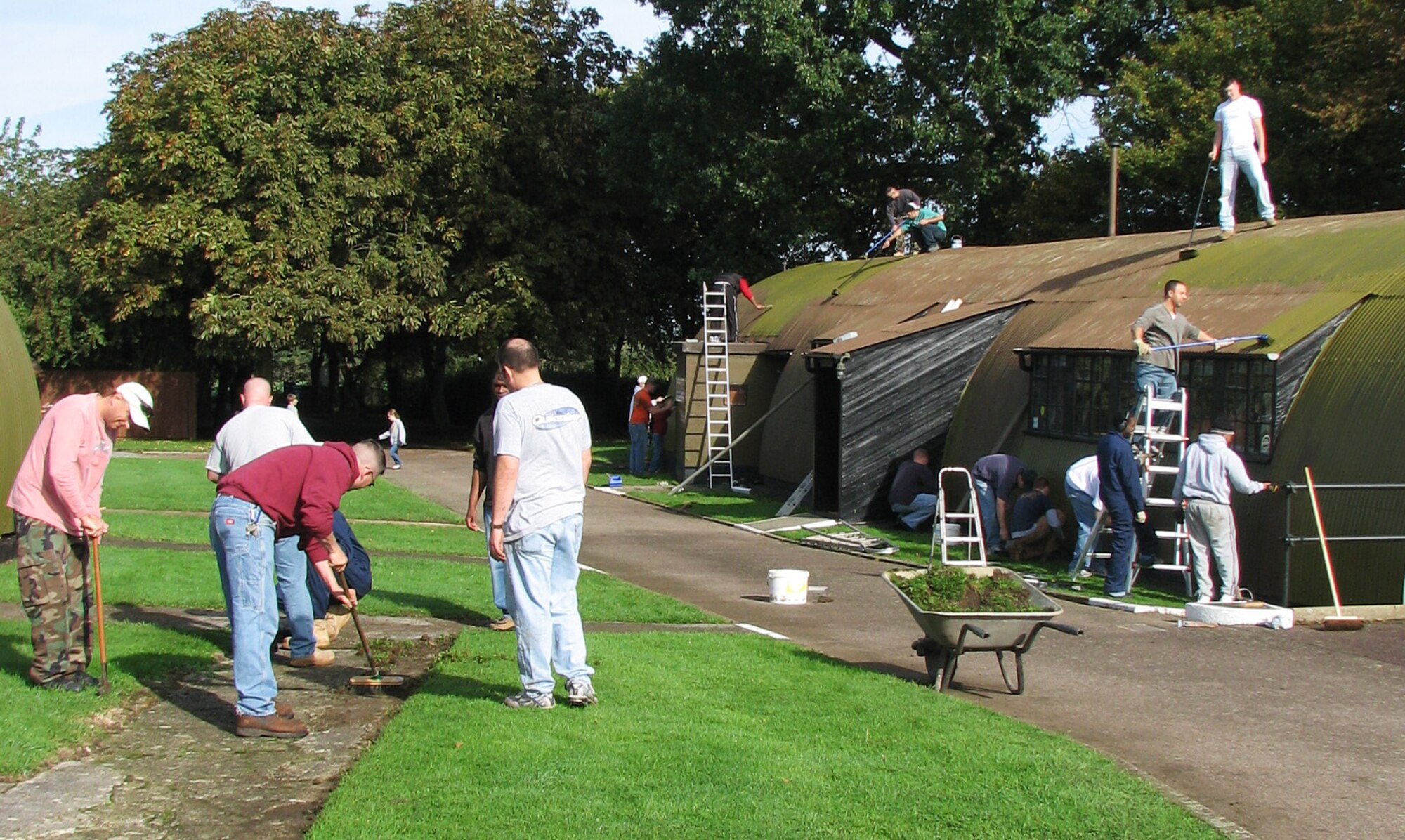 RAF MILDENHALL, England -- Airmen from the 100th Air Refueling Wing provide landscaping and painting services at the 100th Bombardment Group Memorial Museum at Thorpe Abbotts airfield Oct. 2. These volunteers helped renew parts of the site, which houses much of the heritage of the 100th ARW, a descendent of the 100th BG in World War II. (courtesy photo/Becky Ramsey)