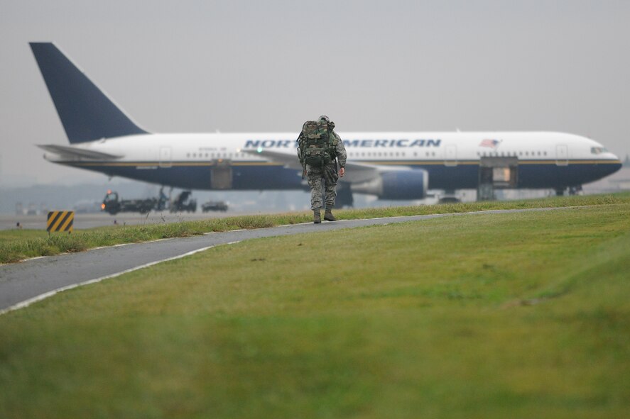YOKOTA AIR BASE, Japan -- 55 Yokota Airmen participated in the 6 mile ruck march, each carrying a minimum 30 pound backpack. (U.S. Air Force photo/Osakabe Yasuo) 