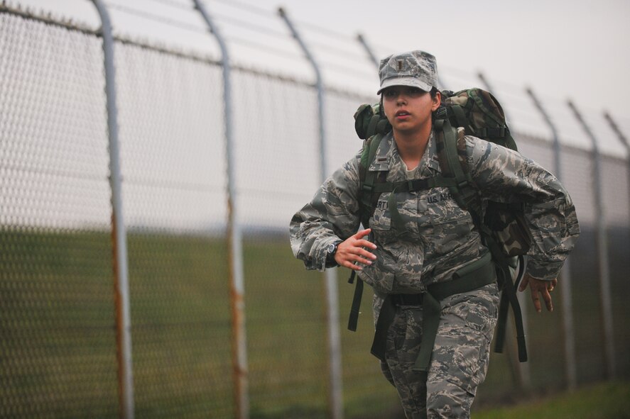 YOKOTA AIR BASE, Japan -- 2nd Lt. Diana Halferty, 374th Logistics Readiness Squadron, carries a 30 pound backpack here Oct. 22 during the Fifth Air Force monthly ruck march. 55 Yokota Airmen participated in the 6 mile march. (U.S. Air Force photo/Osakabe Yasuo)