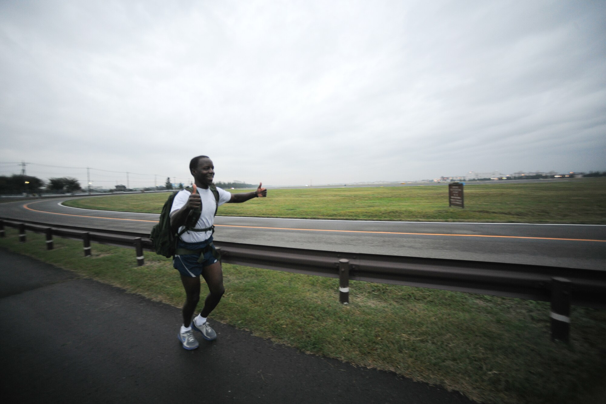 YOKOTA AIR BASE, Japan -- Lt. Gen. Edward Rice Jr., U.S. Forces Japan and Fifth Air Force commander, participates in his last ruck march at Yokota Air Base, Oct. 22.  55 Yokota Airmen participated in the 6 mile march each carrying a minimum 30 pound backpack. (U.S. Air Force photo/Osakabe Yasuo) 