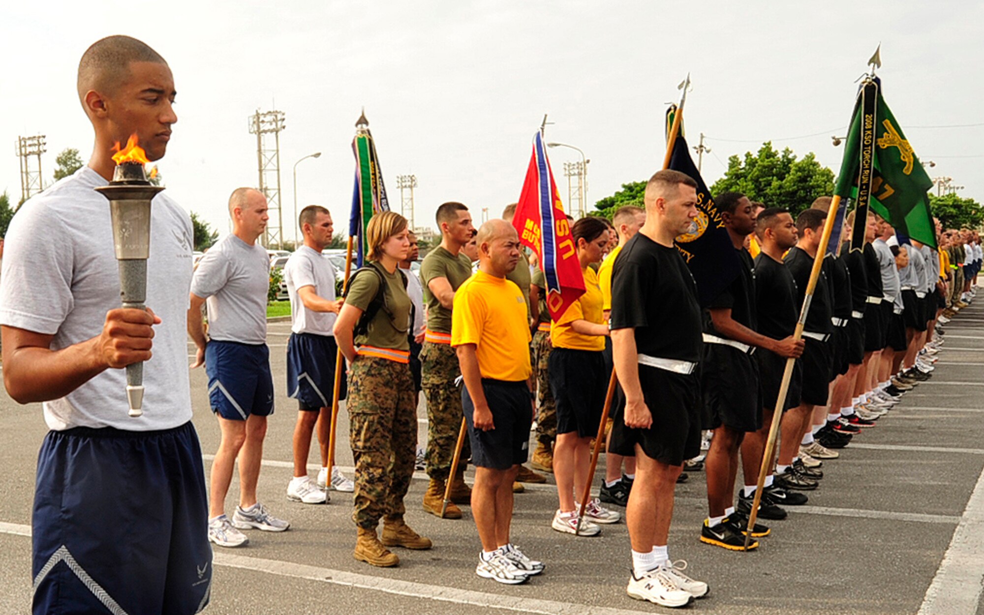 Members representing each branch of service participate in the Kadena Special Olympics torch run here at Kadena Oct. 16. The torch run is one of the last fundraisers over a period of six months leading up to game day. (U.S. Air Force photo/Staff Sgt. Lakisha A. Croley)