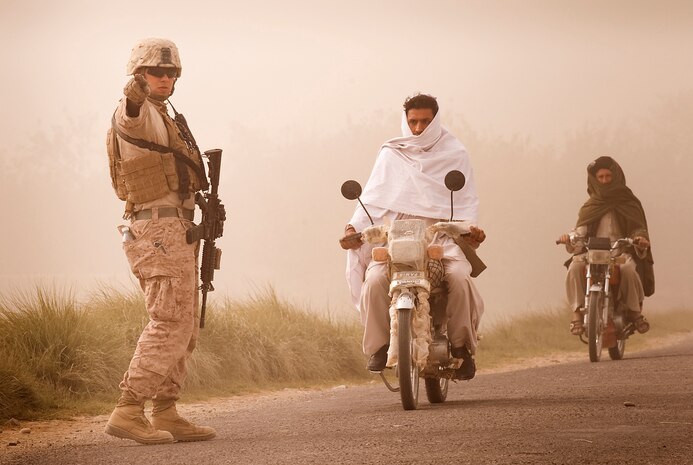 Lance Cpl. James Torres, a rifleman with Jump Platoon, 3rd Battalion, 3rd Marine Regiment, mans a vehicle checkpoint in Helmand province, Afghanistan, Oct. 22, 2010. Jump Platoon’s primary mission is to provide security for the battalion commander and transport him throughout 3/3’s battle space, but the platoon performs a variety of tasks from providing supplementary security and running vehicle checkpoints, to masonry and gardening. (Official Marine Corps photo by Sgt. Mark Fayloga)