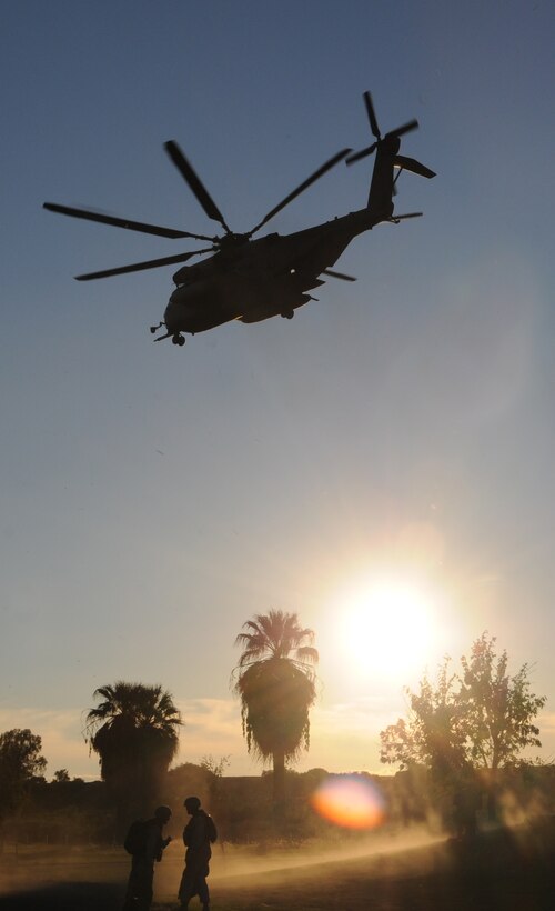 Shortly after dropping off Marines from E Company, 2nd Battalion, 7th Marine Regiment, a CH-53E Super Stallion departs from Pat Williams Park in Brawley, Calif., Oct. 22, 2010. As part of the Weapons and Tactics Instructor course here, different aircrafts transported Marines for the noncombatant evacuation operation, which simulates extracting American citizens from an American embassy in hostile territory.